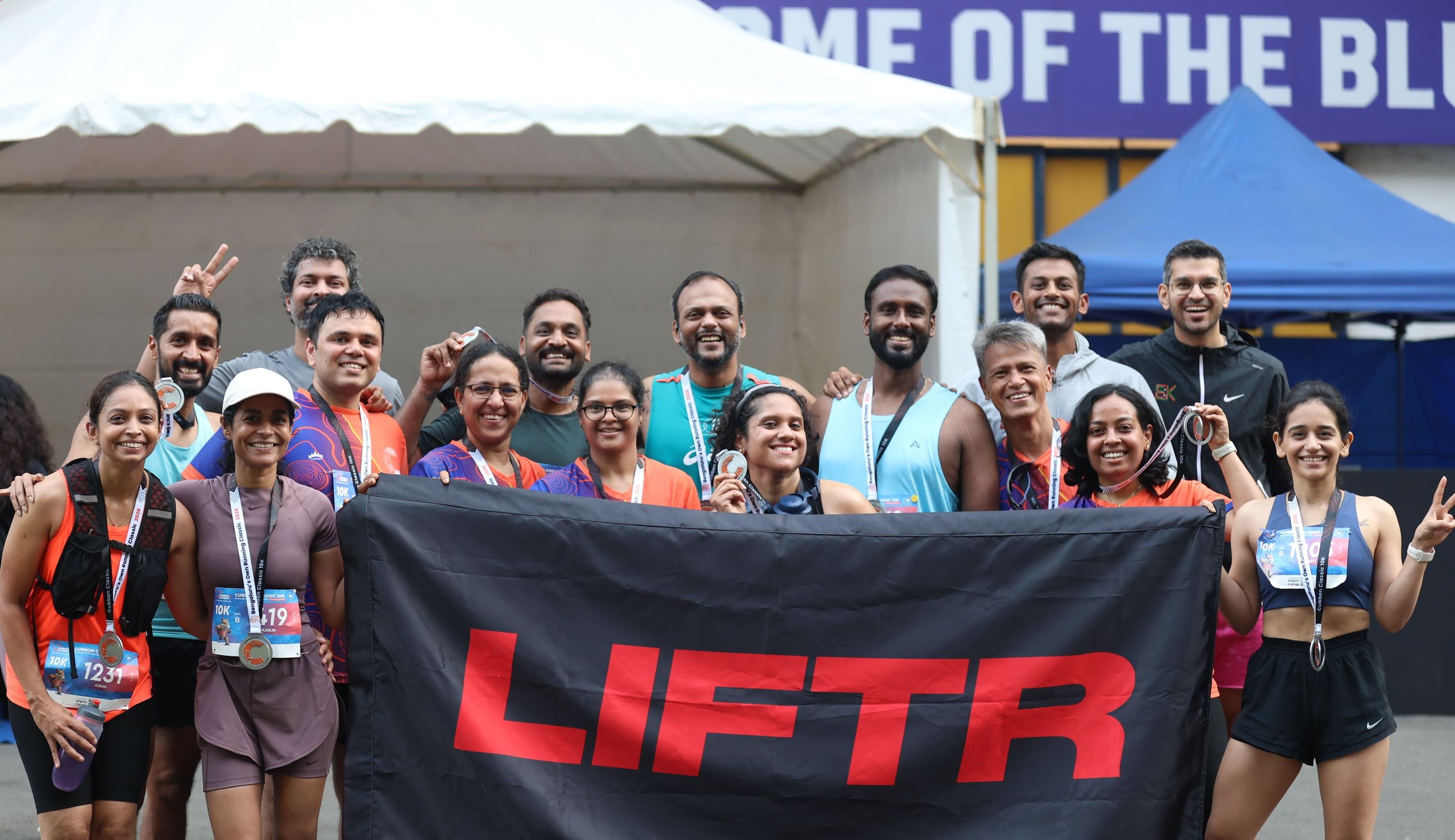 Runners gathered under the tents after Cubbon Classic